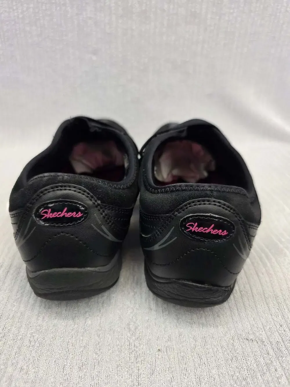 Skechers Women's Black and Pink Slip-On Sneakers SN 22454